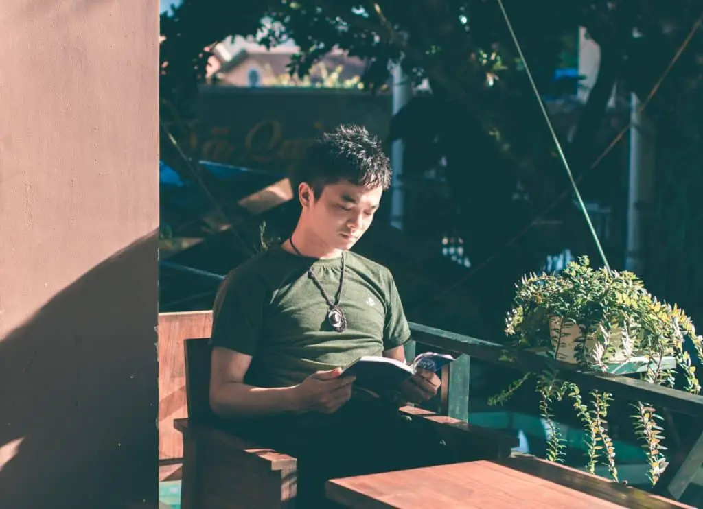 man reading Photo by Zun Zun