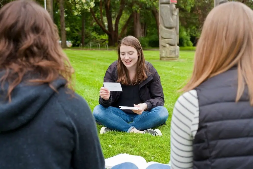 Group of students using flash cards